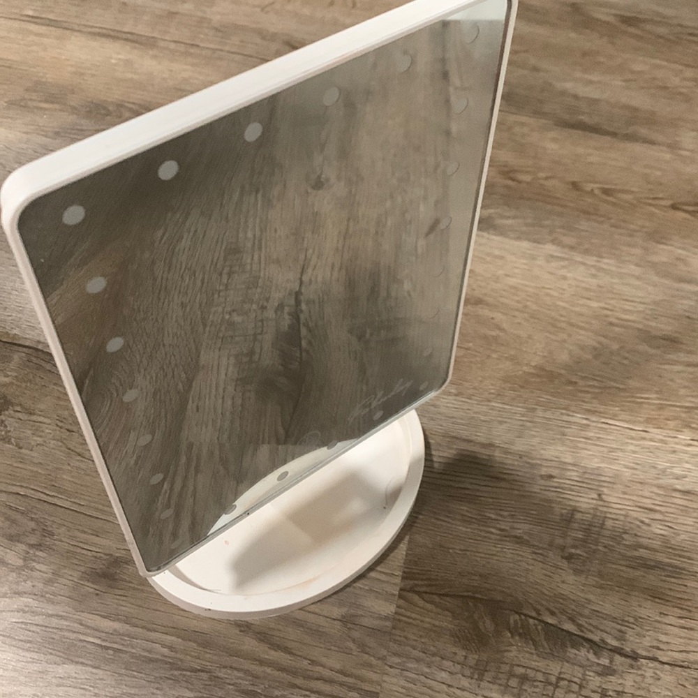 White mirror with lights